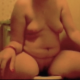 A fat girl records herself taking a soft-sounding shit while sitting on a toilet and then pisses. Some staining is heard while she tries to get more of it out. She wipes and shows us the finished product as it flushes down. Over 1.5 minutes.